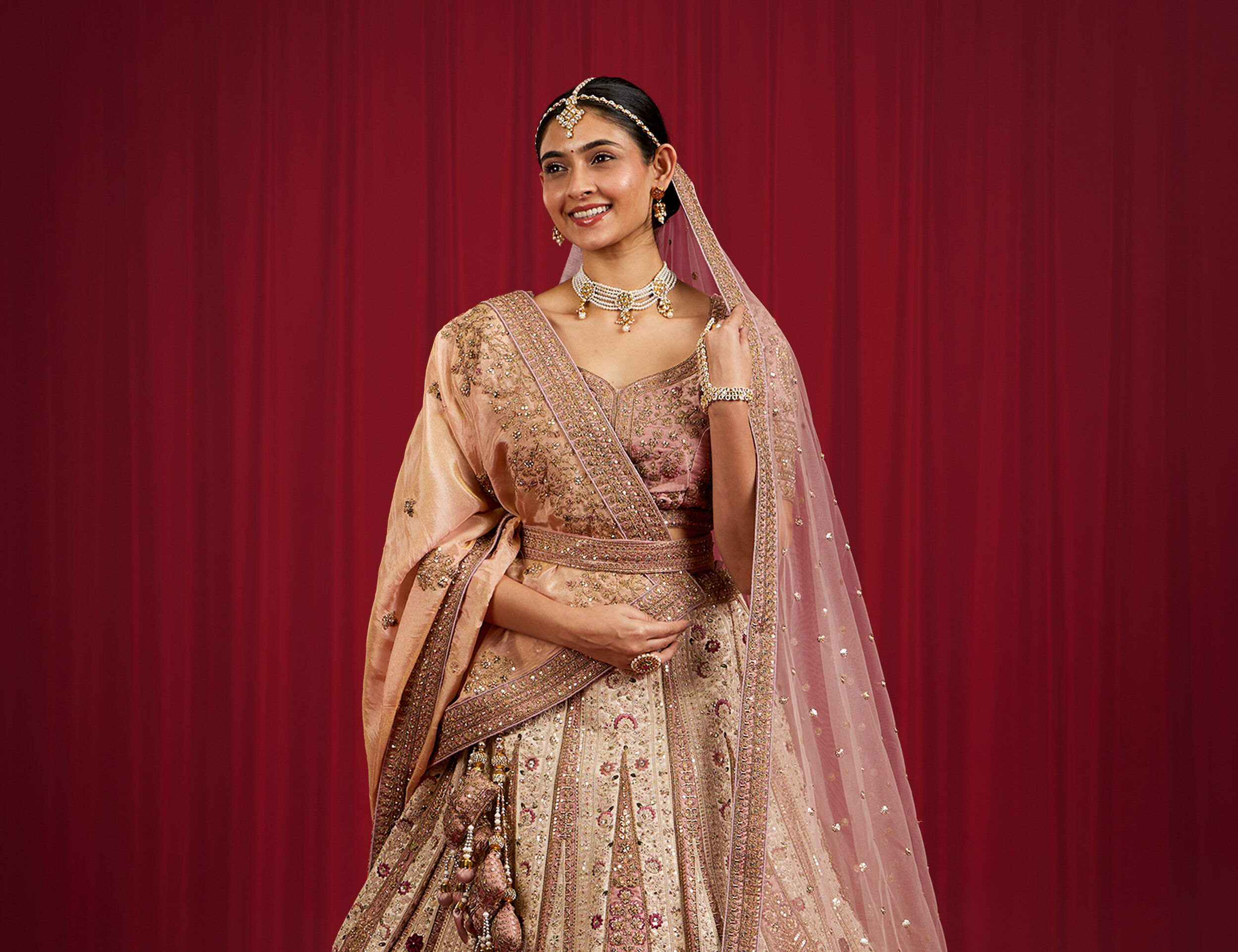 A bride in cream colour bridal lehenga